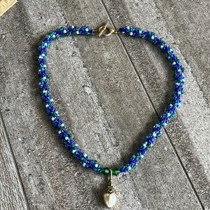 Hand made designer artisan necklace with semiprecious center